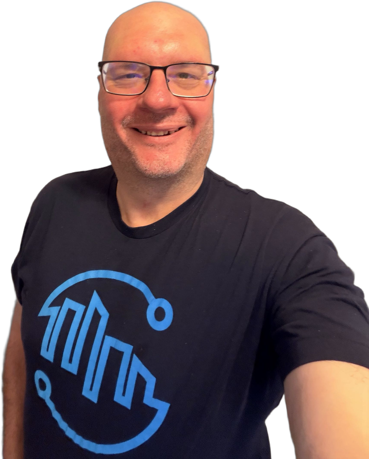 Mike Onslow wearing a Detroit TechWatch shirt